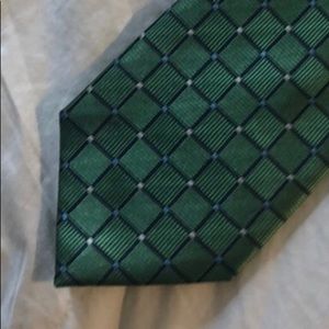 Jos A. Bank men’s tie. Green check 100% silk. New with tag.